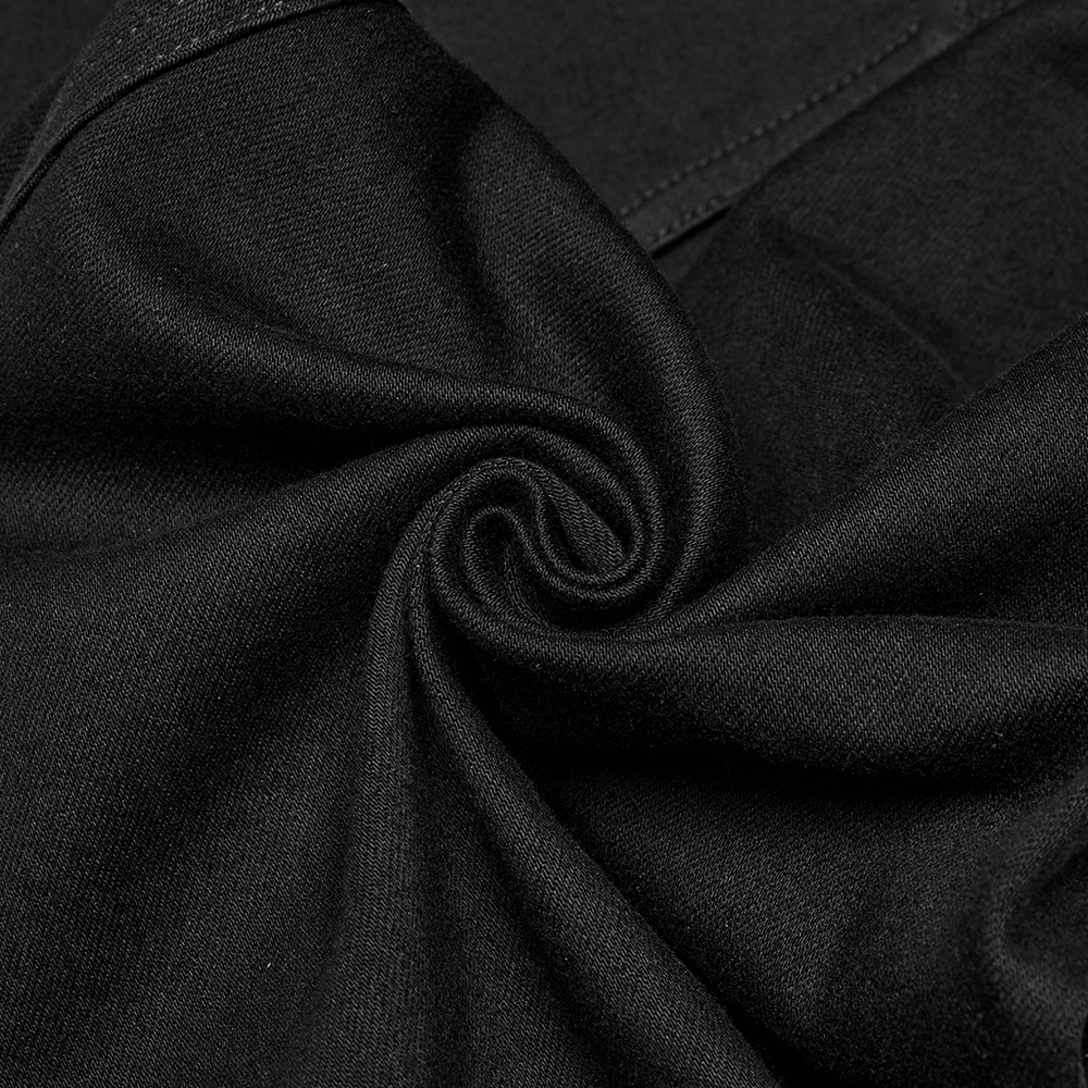 Close-up of elastic black fabric showcasing its soft texture and stretch, ideal for punk mesh detail tight pants.