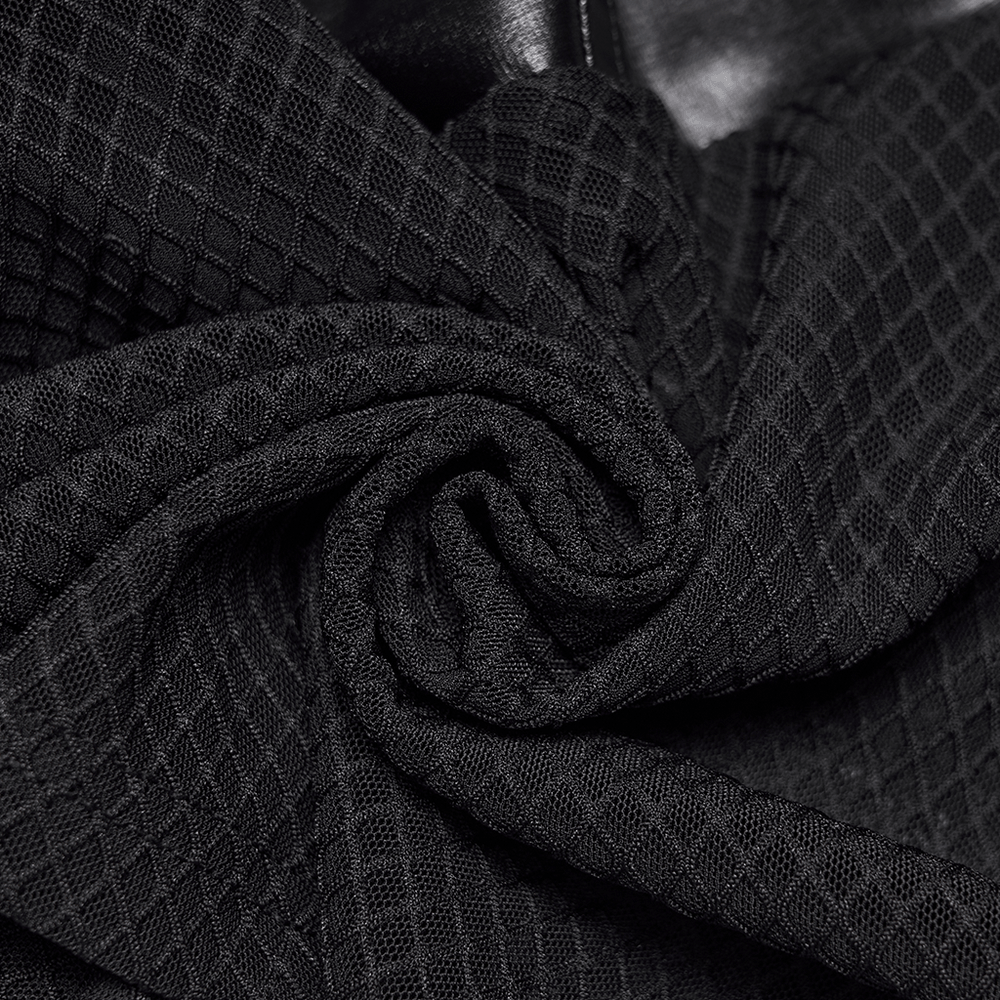 Close-up of black textured fabric showcasing the unique material of the Punk Mesh Hooded Crop Top with Rubberized Panels.