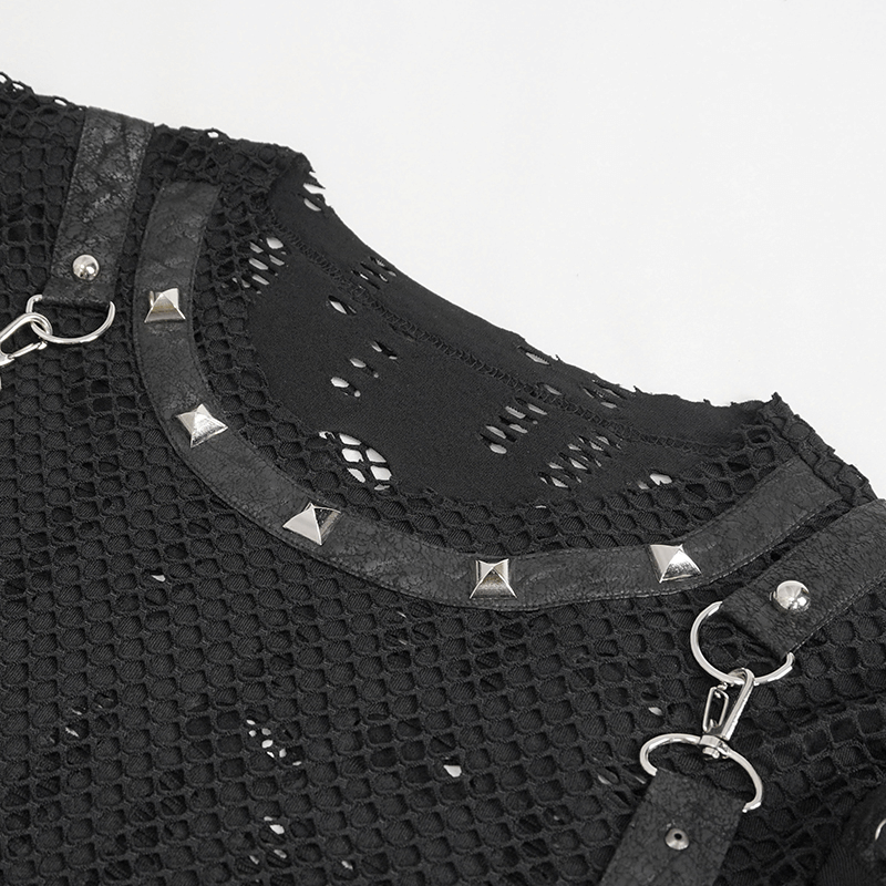 Close-up of black punk mesh t-shirt with silver studs and detachable straps, showcasing rebellious style and unique design.