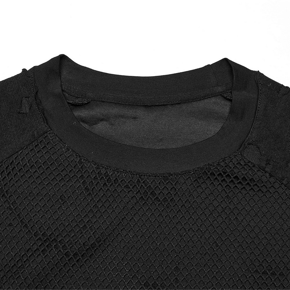 Close-up of a black punk mesh top featuring tattered fabric and unique pocket details.