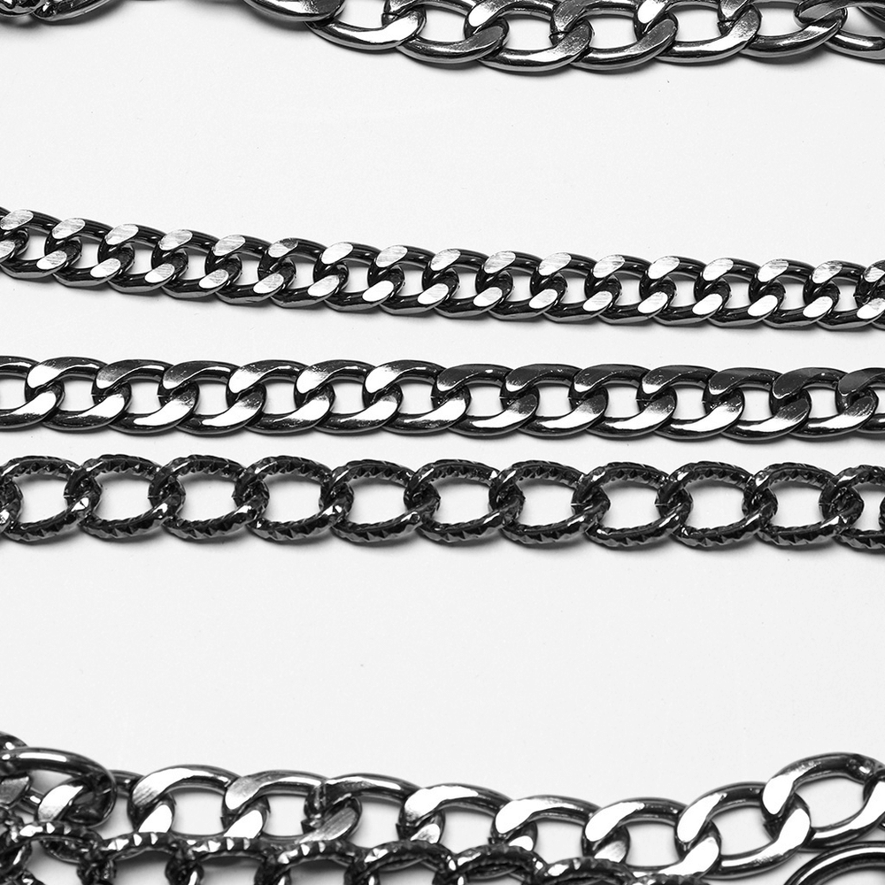 Close-up of black metal chains showcasing different styles and textures for punk fashion accessories.
