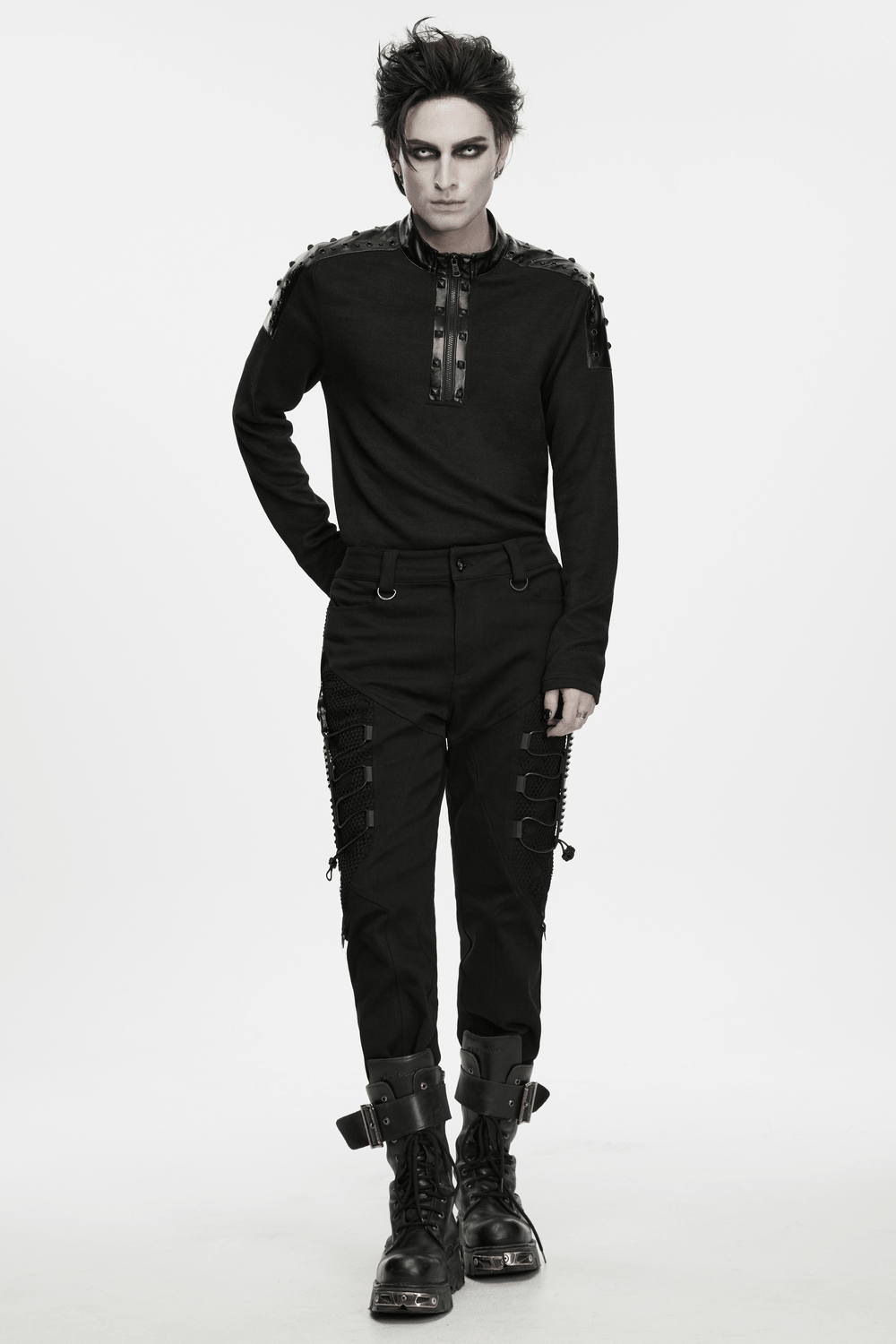 Punk Metal Trim Sweatshirt with High Neck and Studs styled with edgy black pants and combat boots.