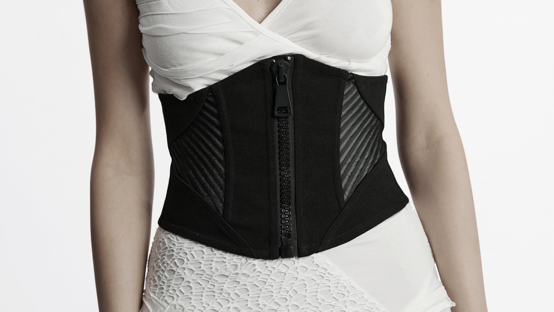 Punk minimalist black corset with mesh splicing and oversized zipper, showcasing edgy fashion.