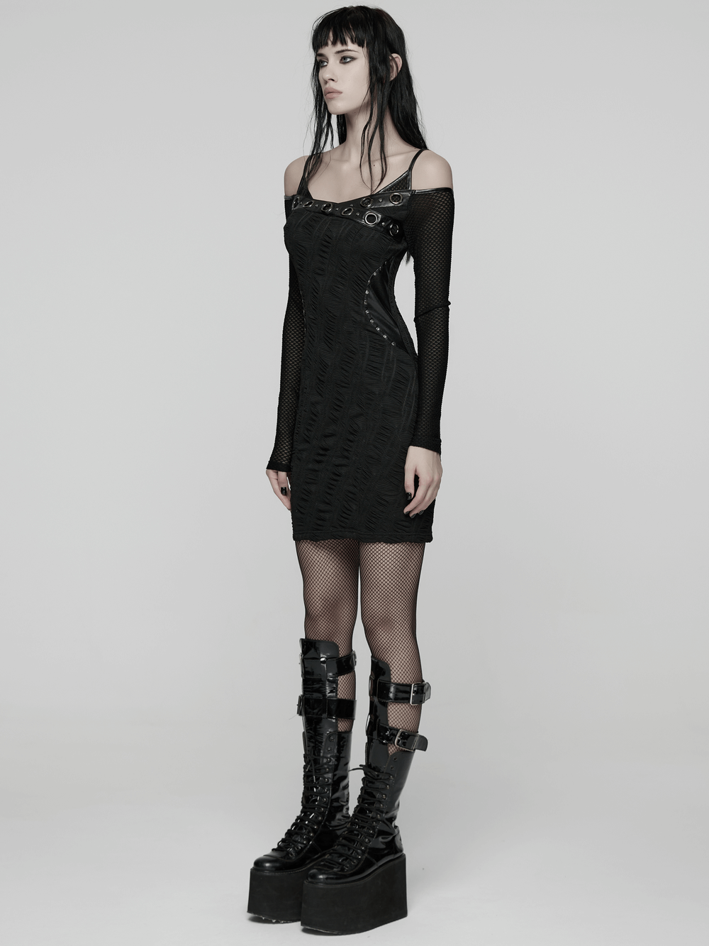 Punk Off-the-Shoulder Bodycon Dress with Metal Eyelets showcased on a model, featuring edgy design and silhouette.