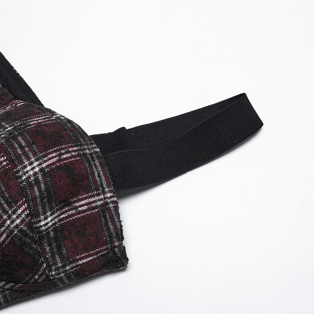 Black adjustable strap on punk plaid top with skull zipper detail, showcasing unique tie-dye pattern.