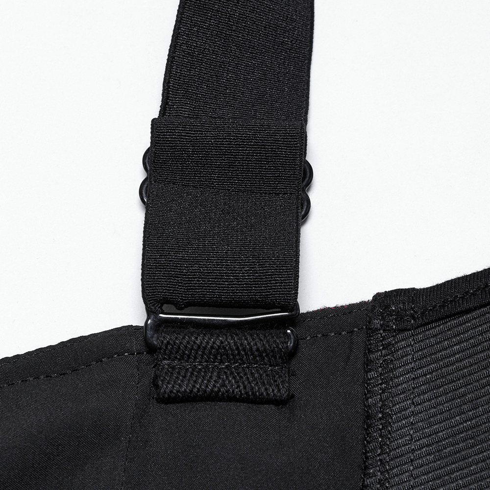 Close-up of adjustable strap buckle from a punk plaid top, showcasing its stylish and functional design.