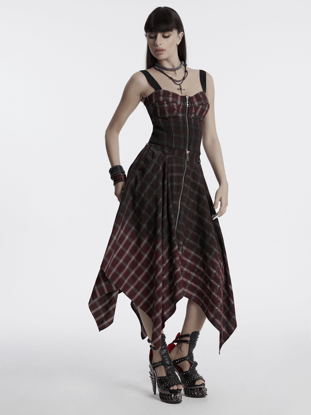 Punk plaid top with skull zipper, adjustable straps, and unique vintage vibe, perfect for bold fashion styles.