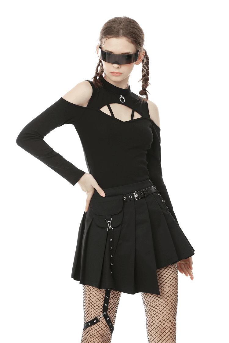 Edgy model wearing a Punk Pleated Female Mini Skirt with Pocket and Leg Belt in black, styled with a chic cut-out top and accessories.