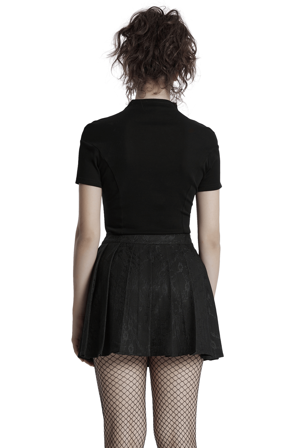 Back view of a model wearing a punk pleated skirt with chains and floral net design, paired with a fitted black top.