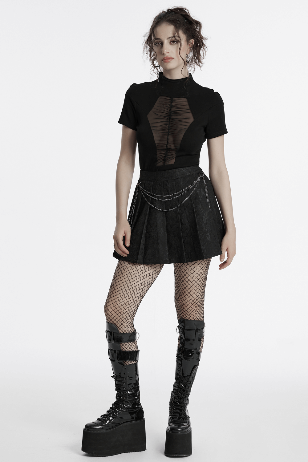 Punk pleated skirt with chains, floral net design, paired with a stylish black top and edgy platform boots.