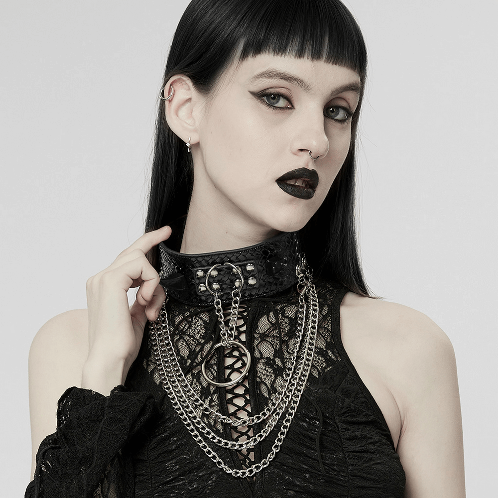 Model showcasing a Punk Python Grain Choker with chains and spikes, inspired by edgy punk style.