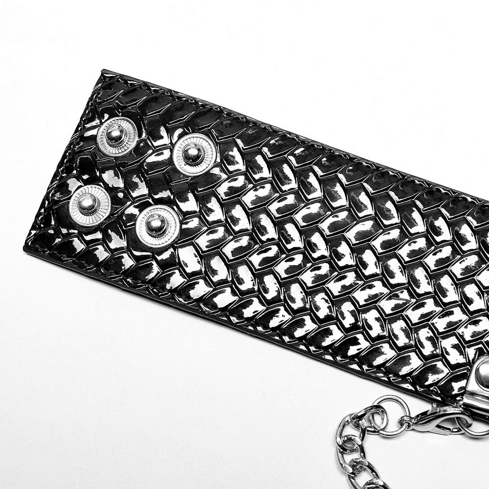 Close-up of Punk Python Grain Choker featuring rivets and a chain for a rebellious style.