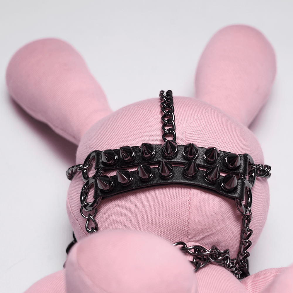 Alt Tag: Punk Rabbit Plush Chain Waist Accessory Charm close-up, pink bunny plush with black spiked chain harness detail