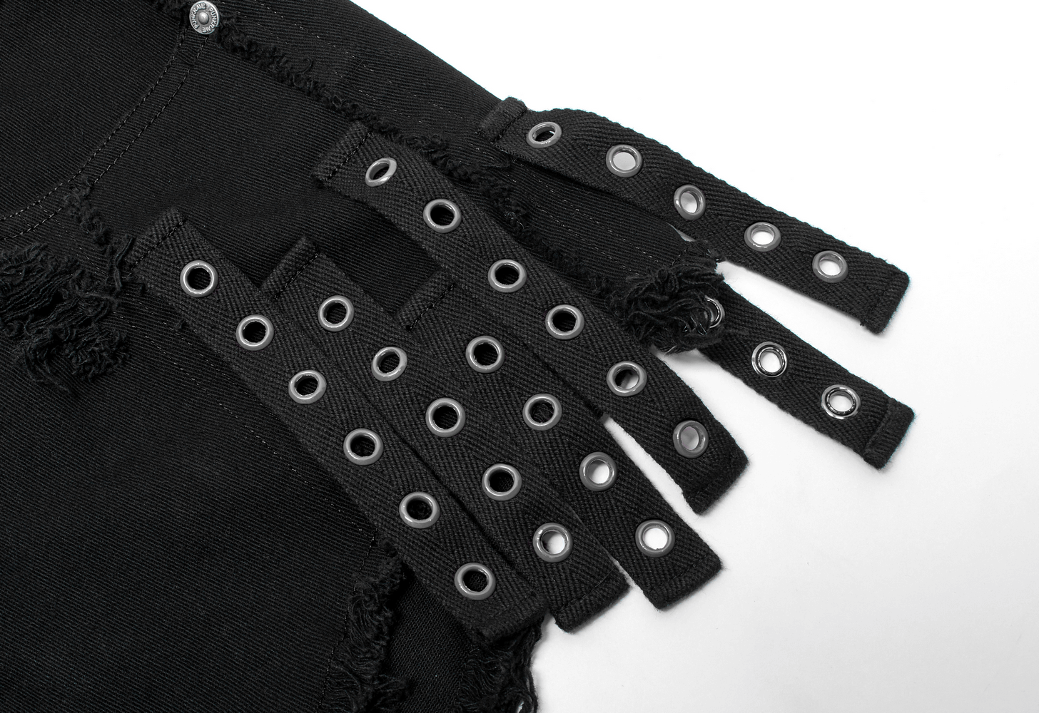 Close-up of punk rave black denim shorts featuring edgy side lace detail and metallic grommets.