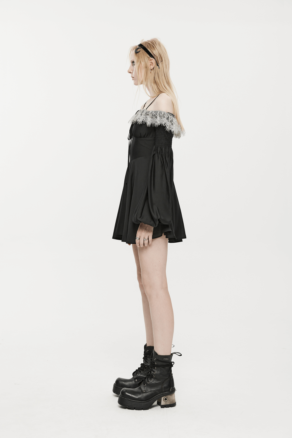Black Gothic off-shoulder mini dress with lace detail, showcasing a whimsical dark romance style.