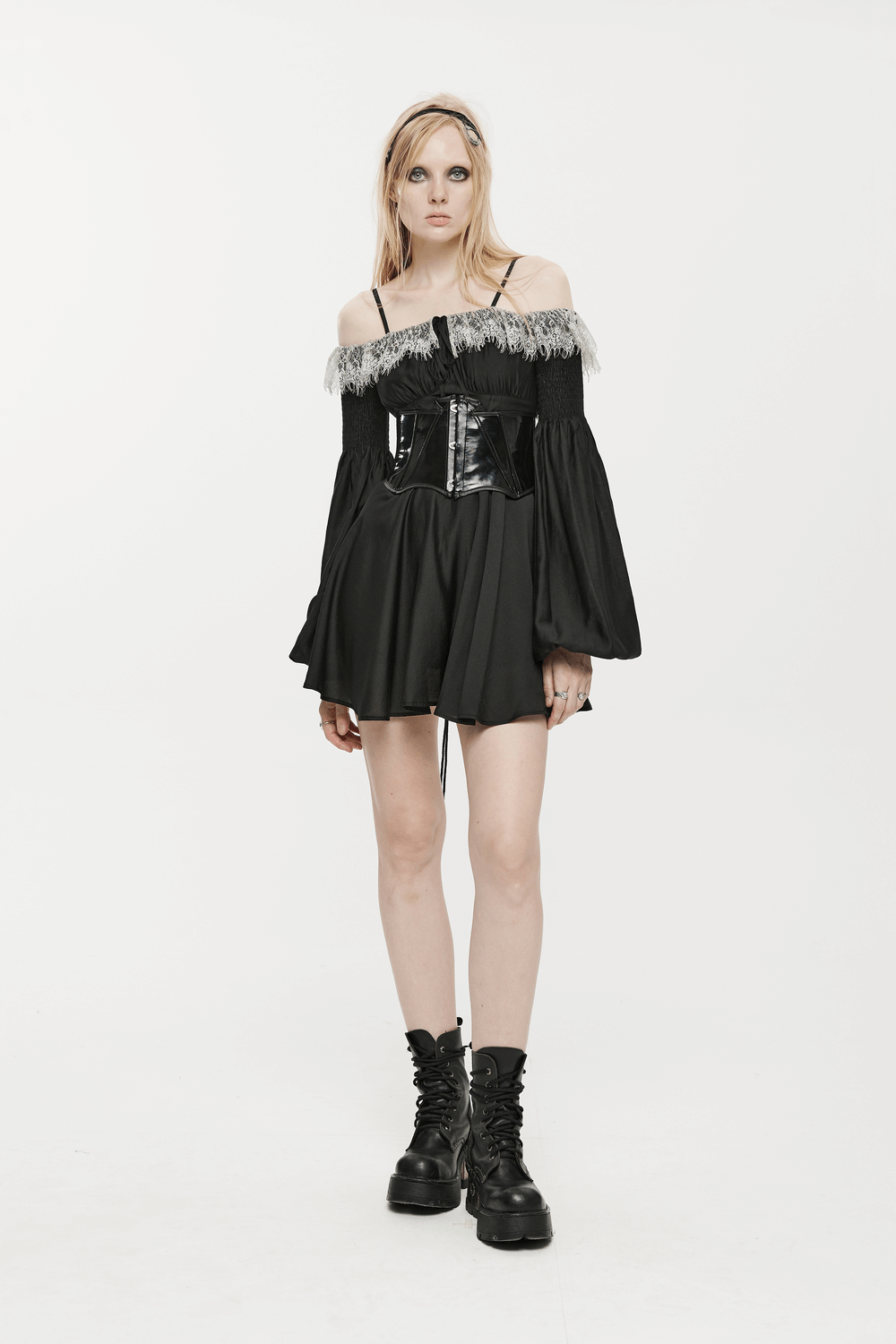 Model wearing a Punk Rave black gothic off-shoulder mini dress with a lace edge and cinched waist, exuding dark romance.