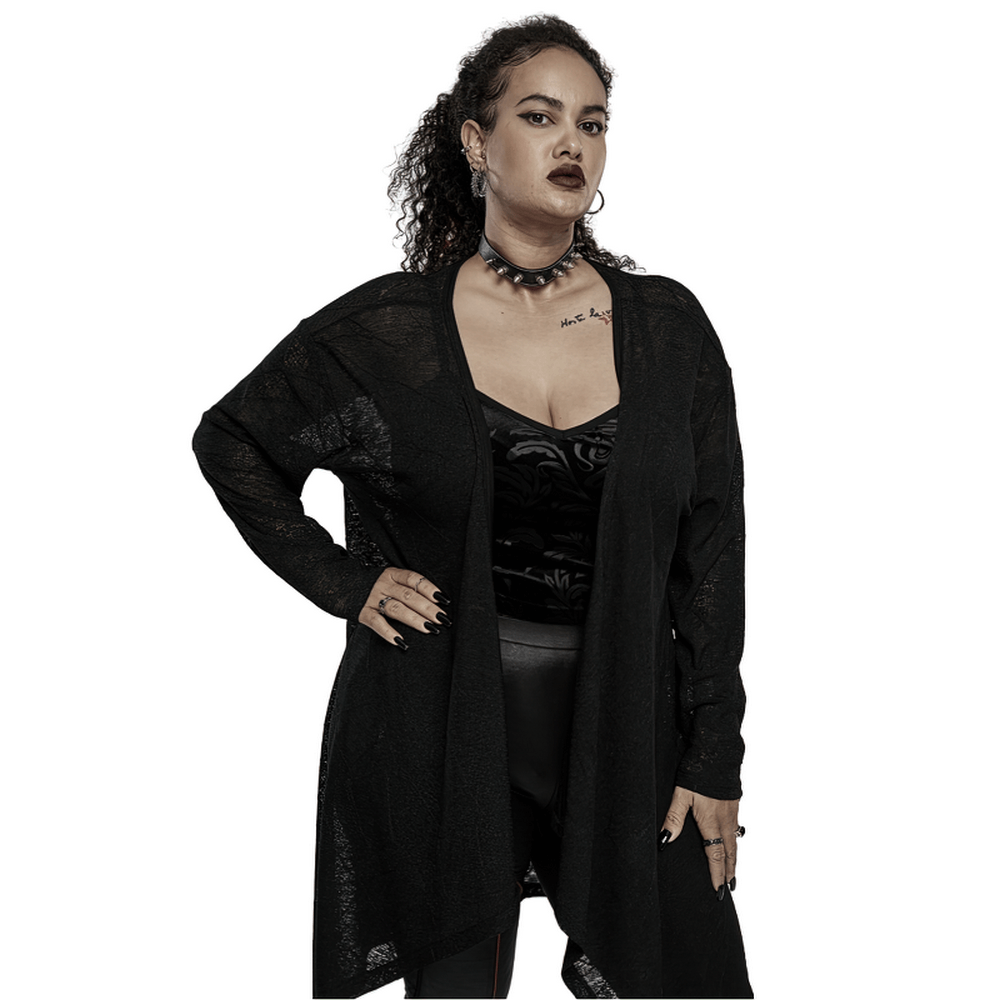 Model wearing a black skull lace knit cardigan with an asymmetrical hem, showcasing edgy goth style.