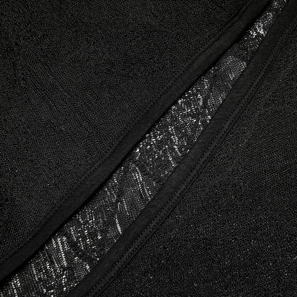 Close-up of textured black fabric with lace details for a punk goth cardigan.