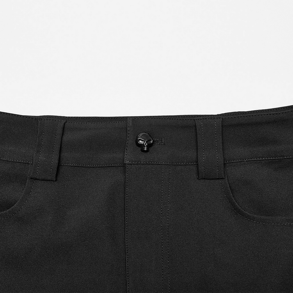 Close-up of black A-line midi skirt waistband with punk metal button detail.