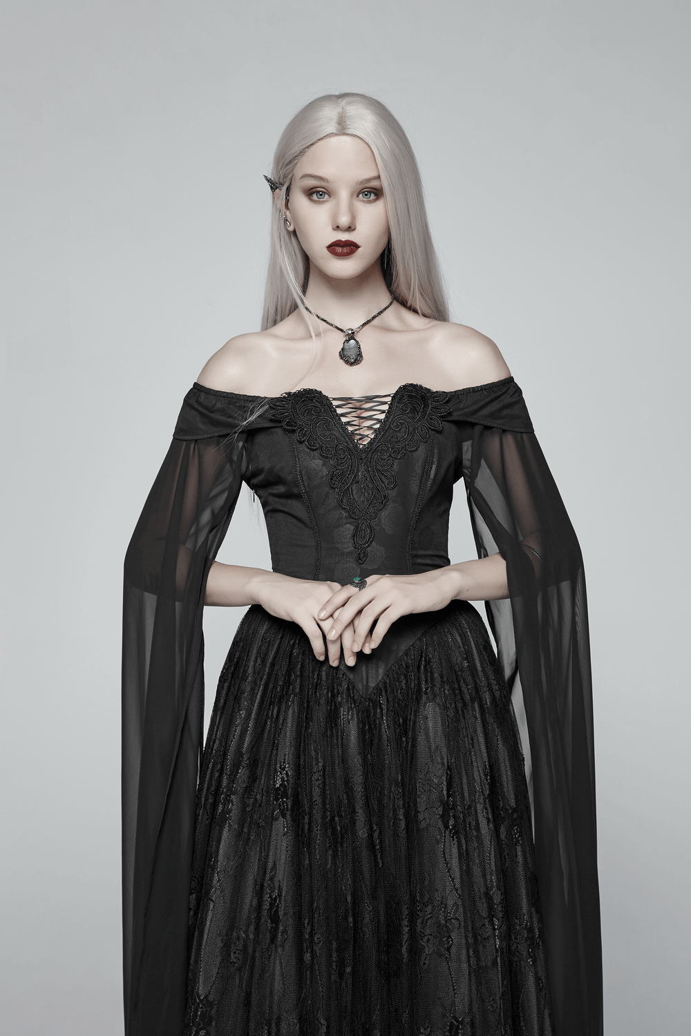 Model wearing the Punk Rave Celestia Gothic Victorian Lace Long Dress with lace overlays and chiffon sleeves.