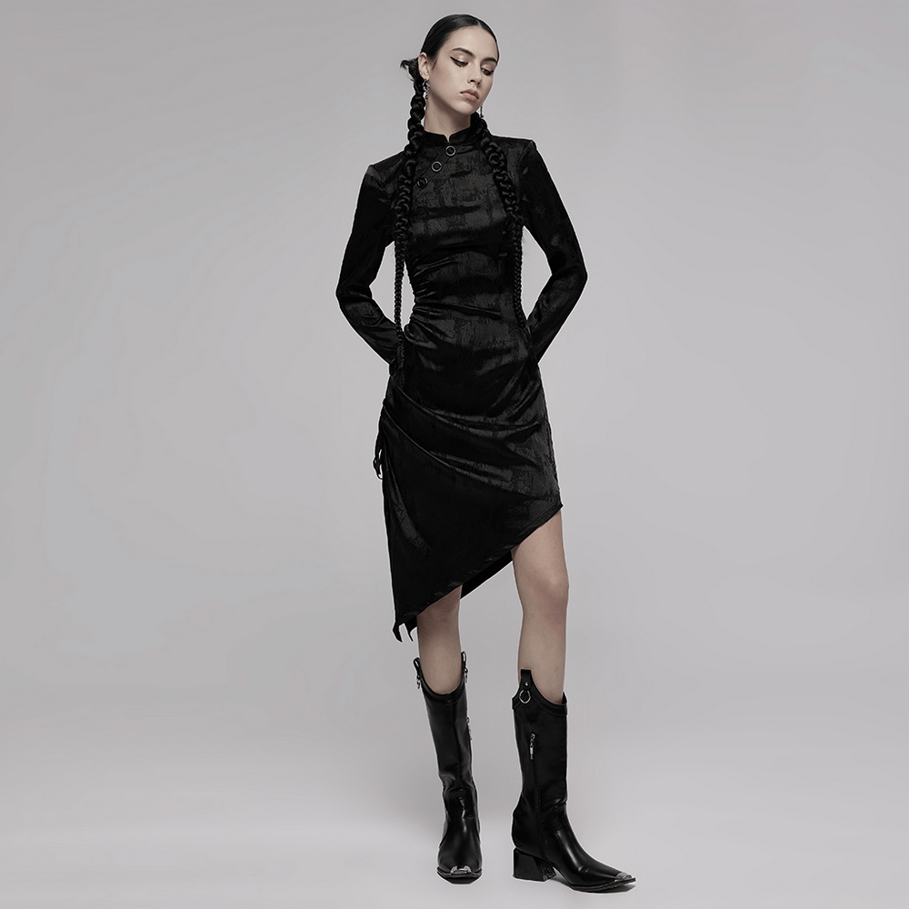 Punk Rave Gothic Cheongsam Dress in black with pointed hem and long sleeves, styled with sleek black boots.
