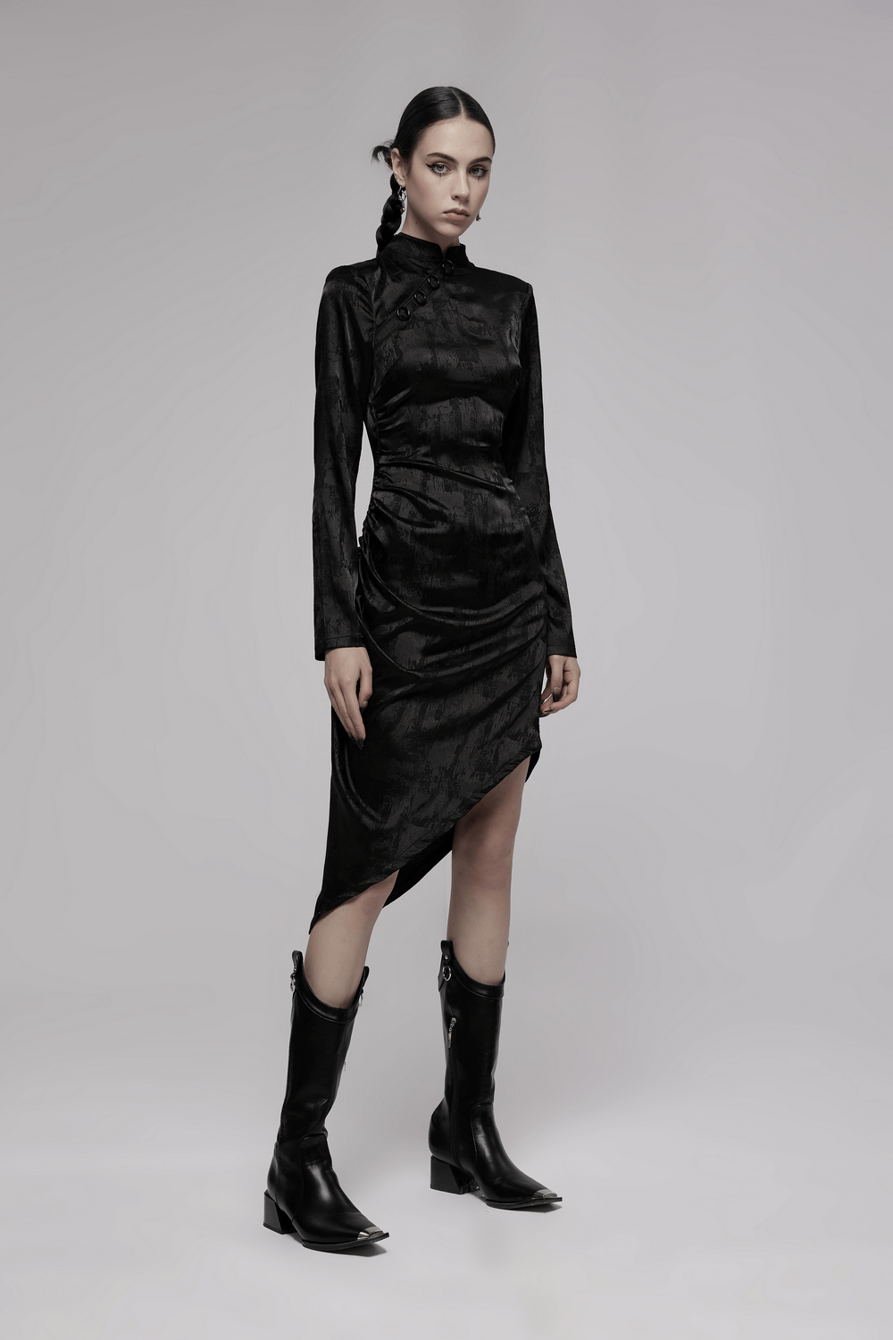 Gothic black cheongsam dress with pointed hem, long sleeves, and concealed buckles, paired with sleek black boots.