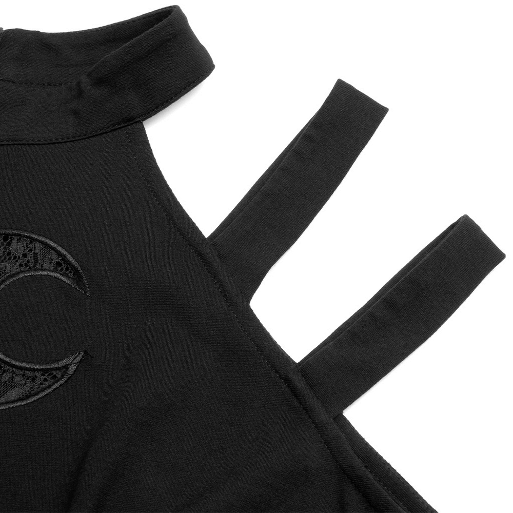 Close-up of the lace embroidered crescent moon detail and skinny shoulder straps on a black gothic dress.