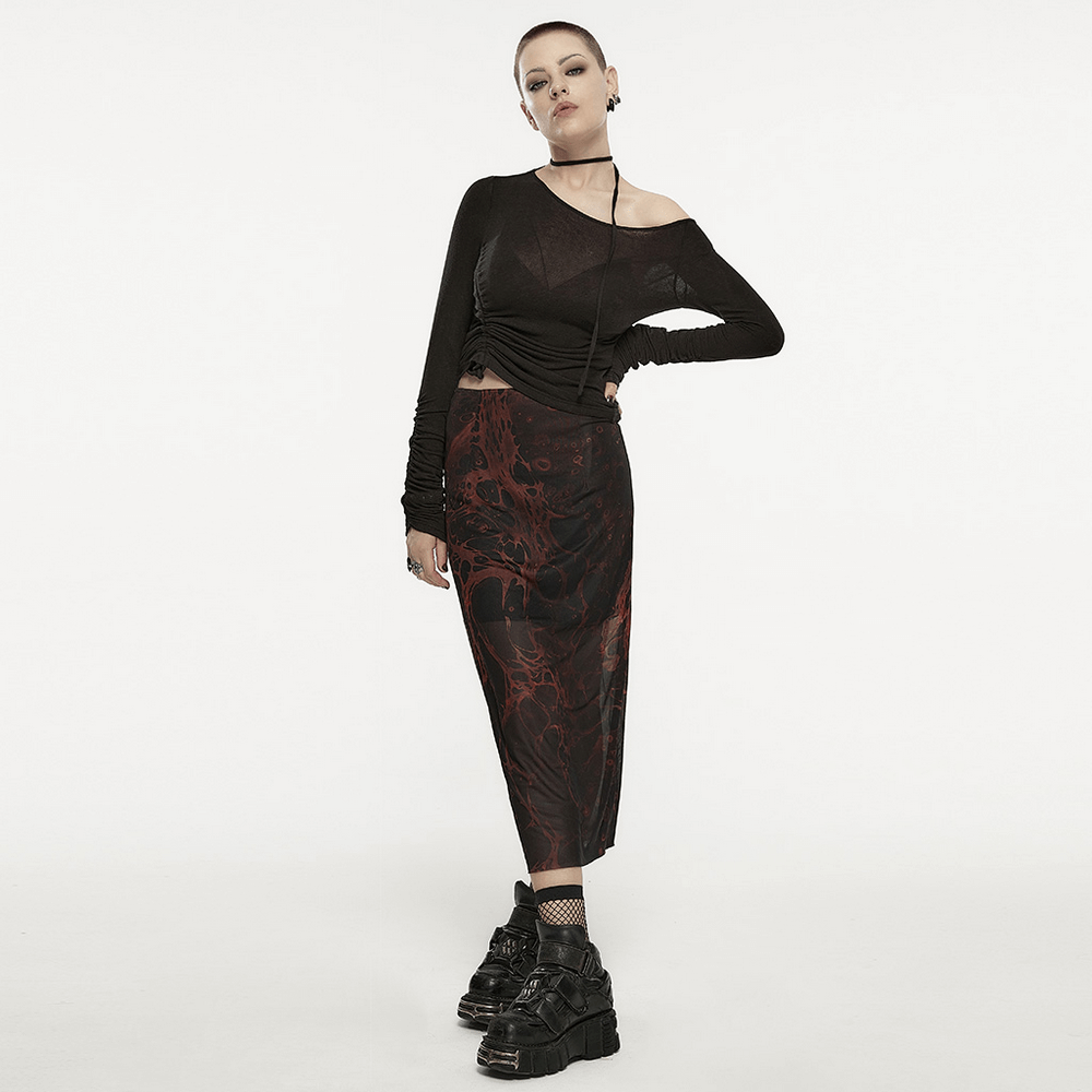 Model wearing Punk Rave Gothic Lava Skirt with irregular print, styled with edgy accessories and chunky boots.