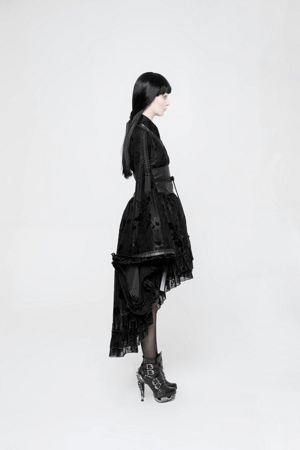 Model wearing a Punk Rave Gothic Lolita Flocking Lace Kimono Maxi Dress with stylish boots.