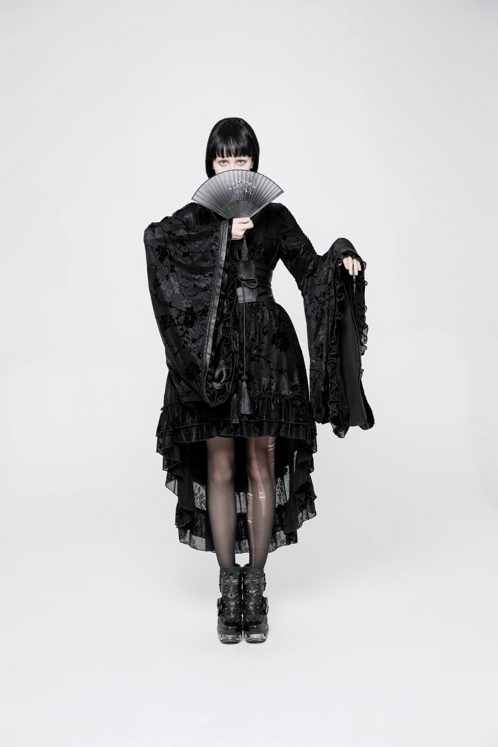 Model wearing a Punk Rave Gothic Lolita kimono dress with lace, holding a fan in a dramatic pose.