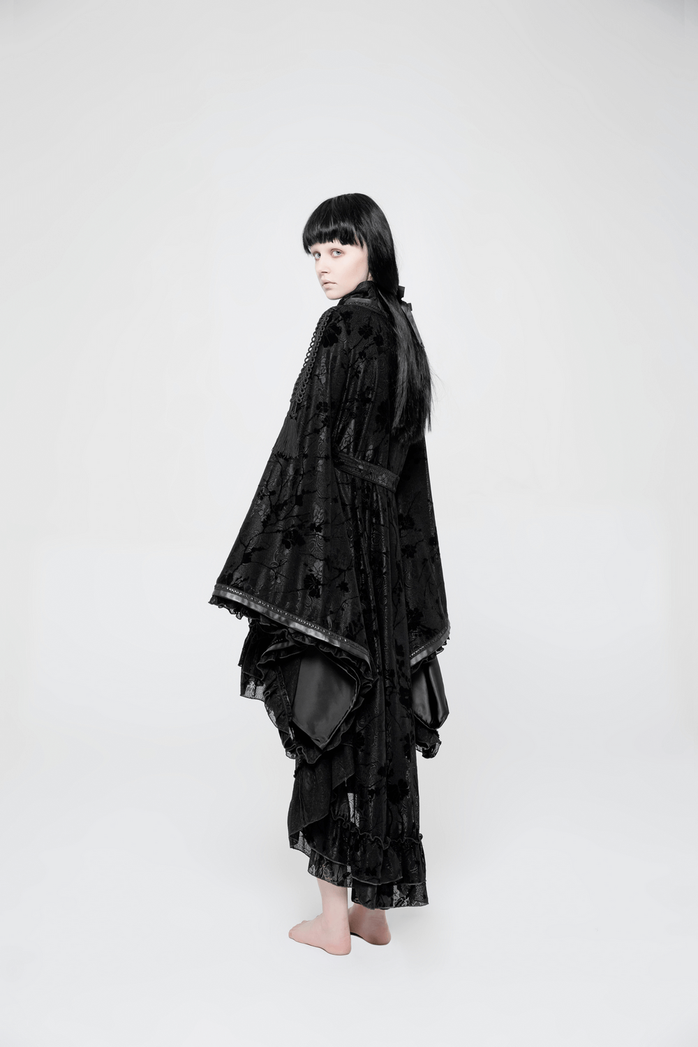 Model showcasing a Punk Rave Gothic Lolita flocking lace kimono dress, exuding dark elegance and Victorian charm.