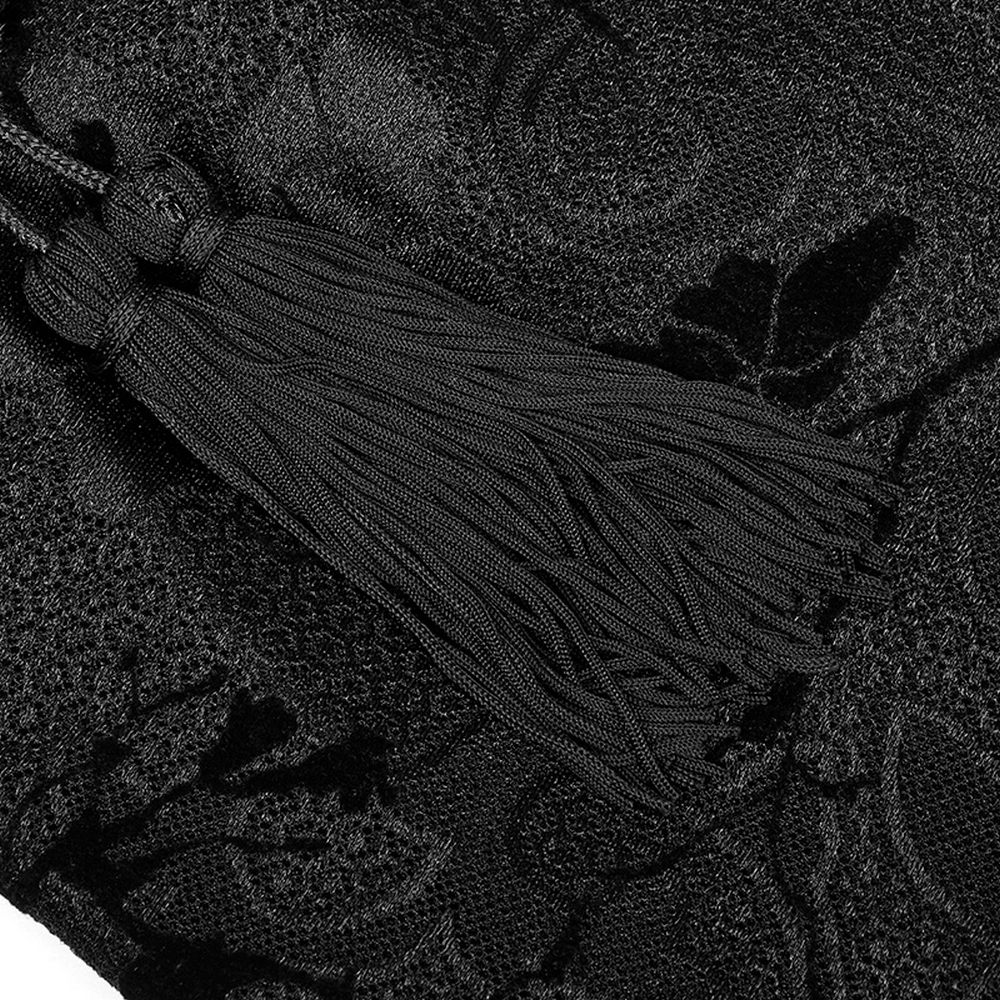 Close-up of Punk Rave Gothic Lolita dress with intricate flocking pattern and stylish tassel detail.