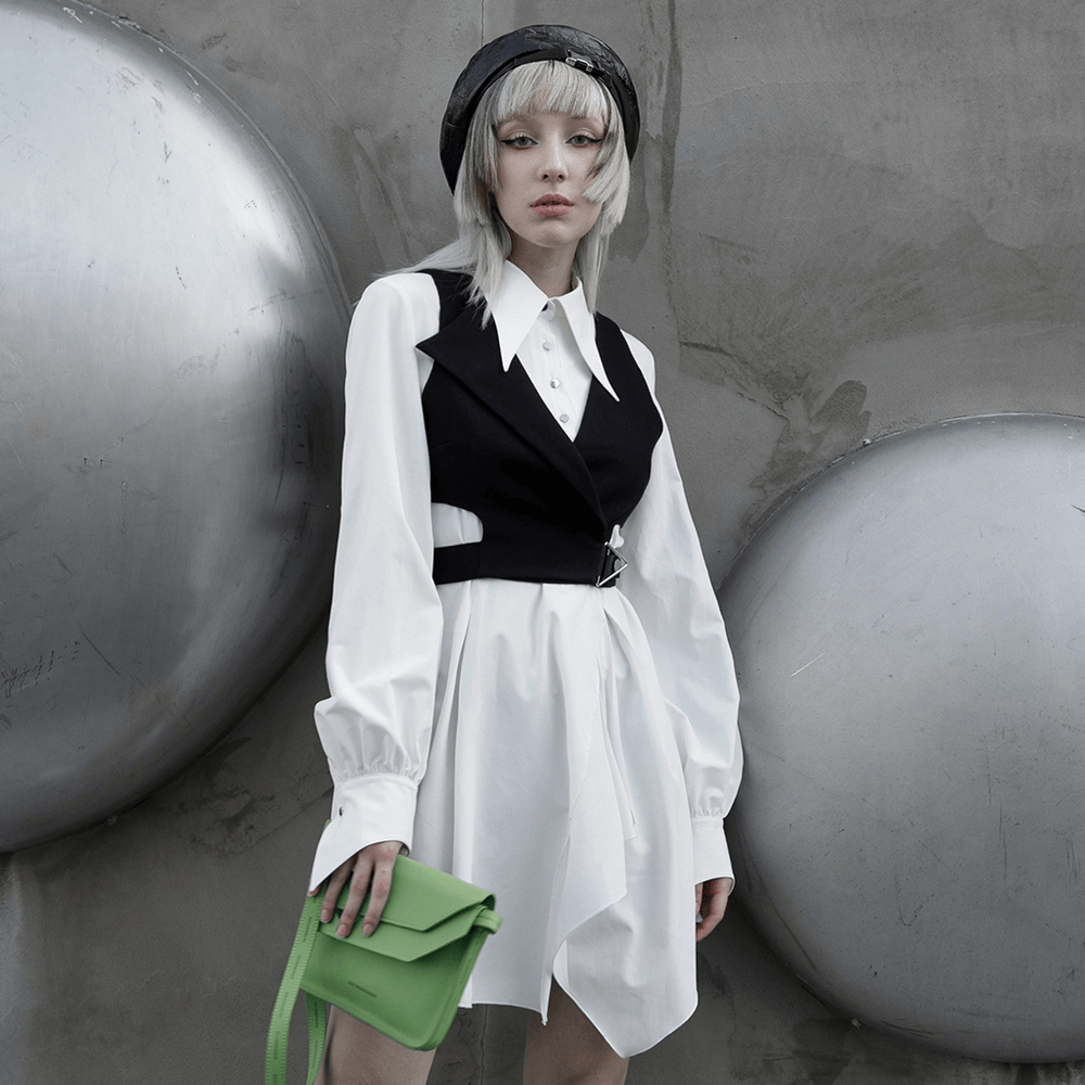 Punk Rave Gothic White Swallowtail Shirt Dress with asymmetrical hem, styled with a green handbag and dramatic backdrop.