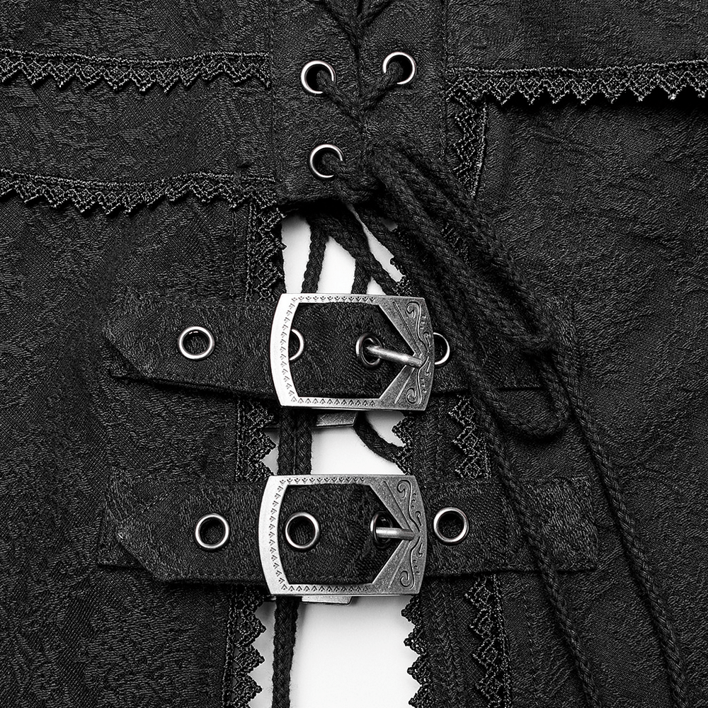 Close-up of Punk Rave high-low skirt detailing featuring black jacquard fabric and metal buckle closures.