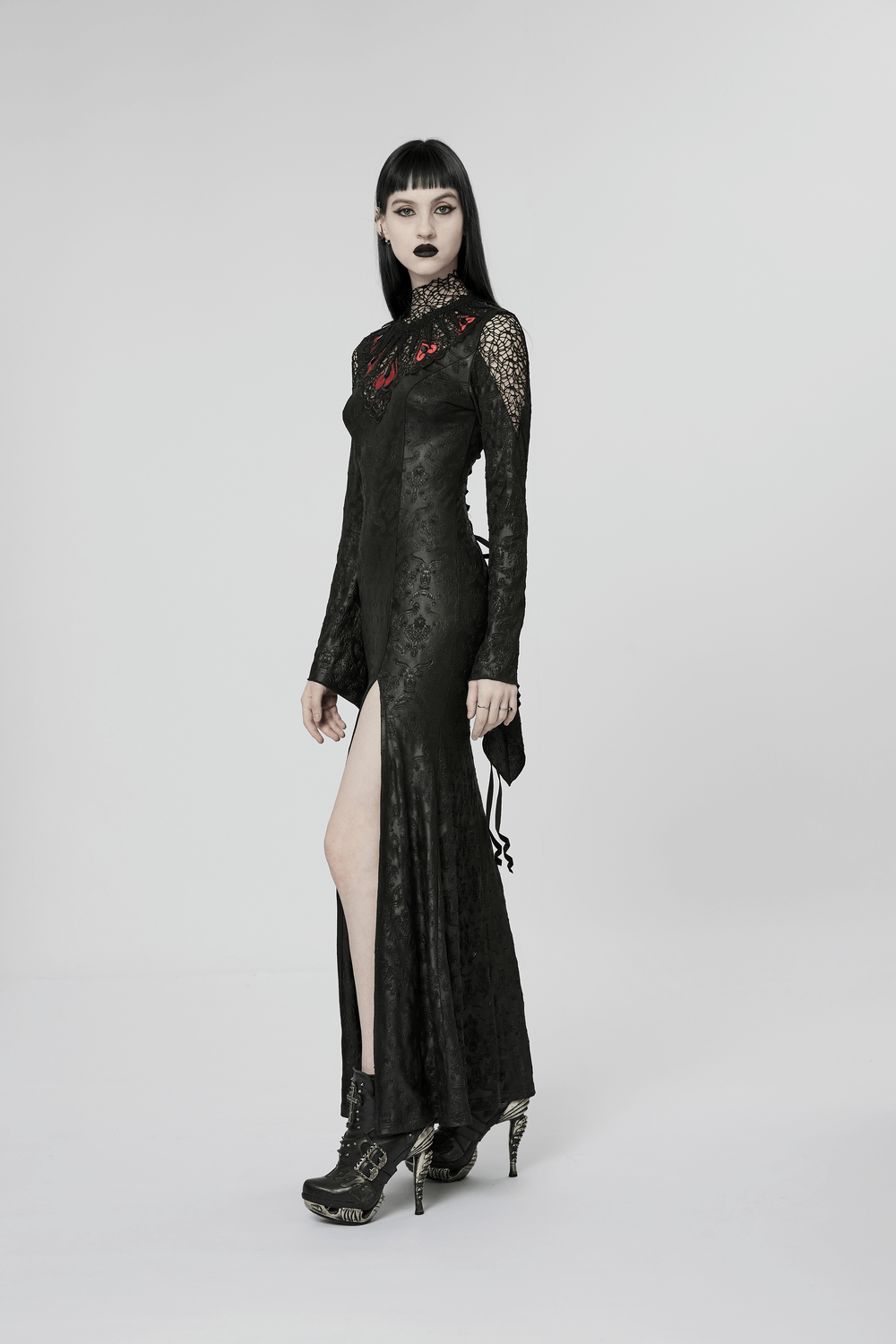 Gothic black embossed rose mesh gown with flared sleeves and plunging V-neck; perfect for dark elegance.