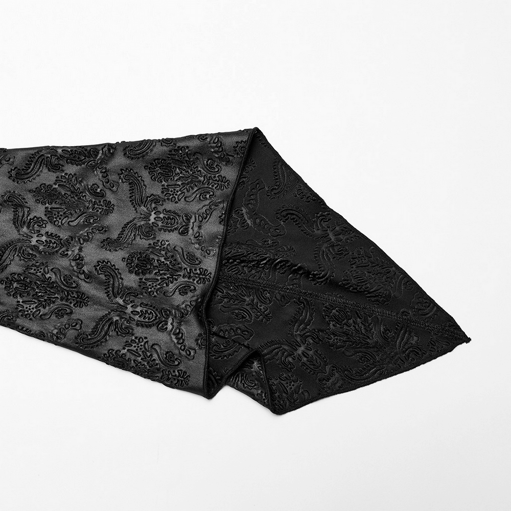 Black embossed fabric with intricate rose patterns, perfect for a gothic or vintage dress.