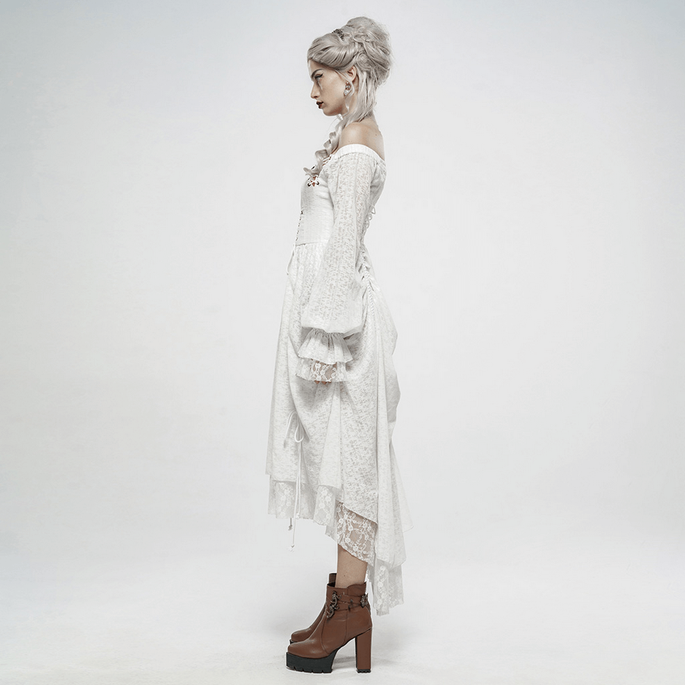 Side view of a model in a Punk Rave white gothic lace dress with lantern sleeves and stylish brown boots.