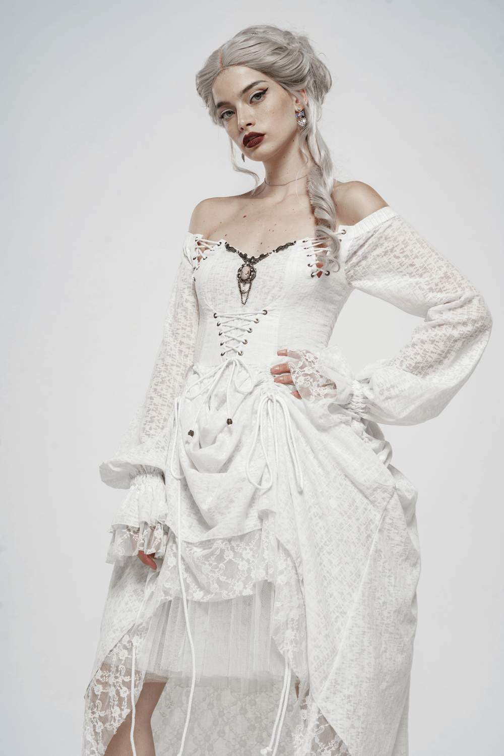 Punk Rave white gothic lace dress with lantern sleeves and vintage metal accents.