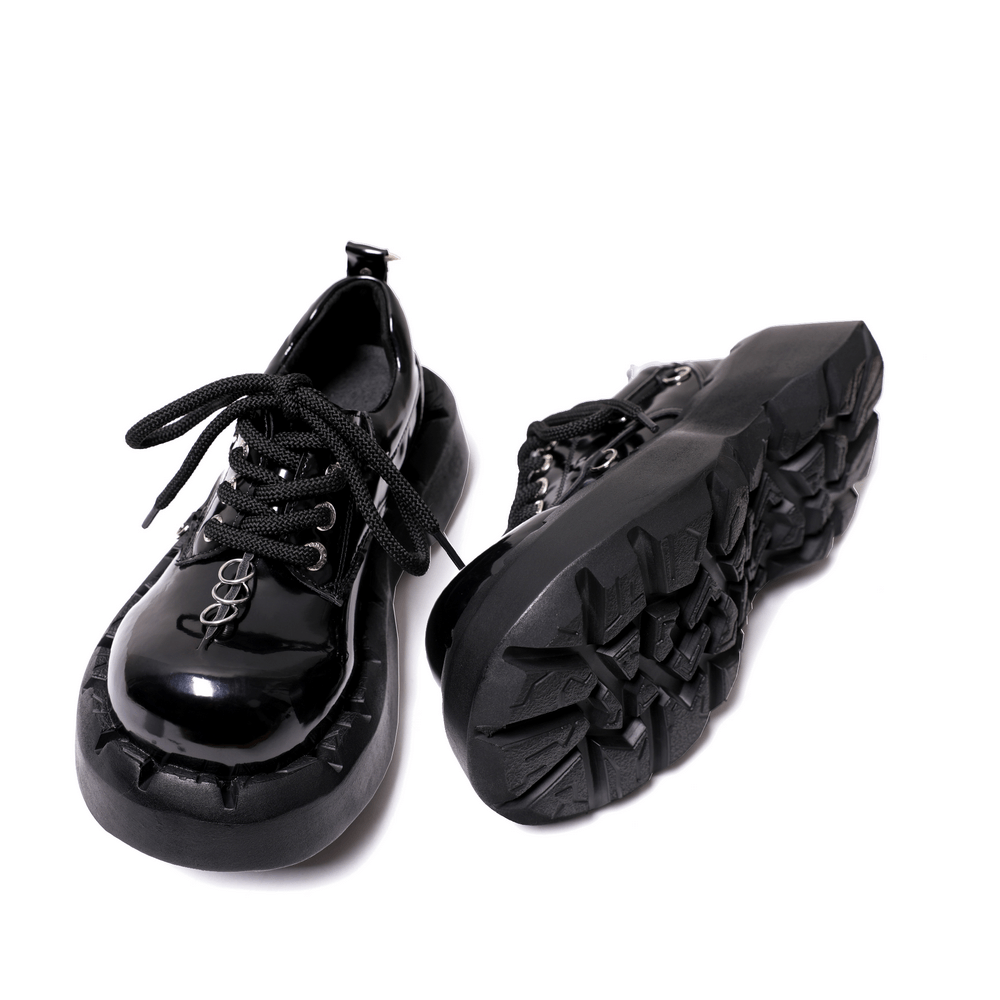 Punk Ring Detail Thick Sole Alternative Platform Footwear featuring glossy black patent material and chunky sole.