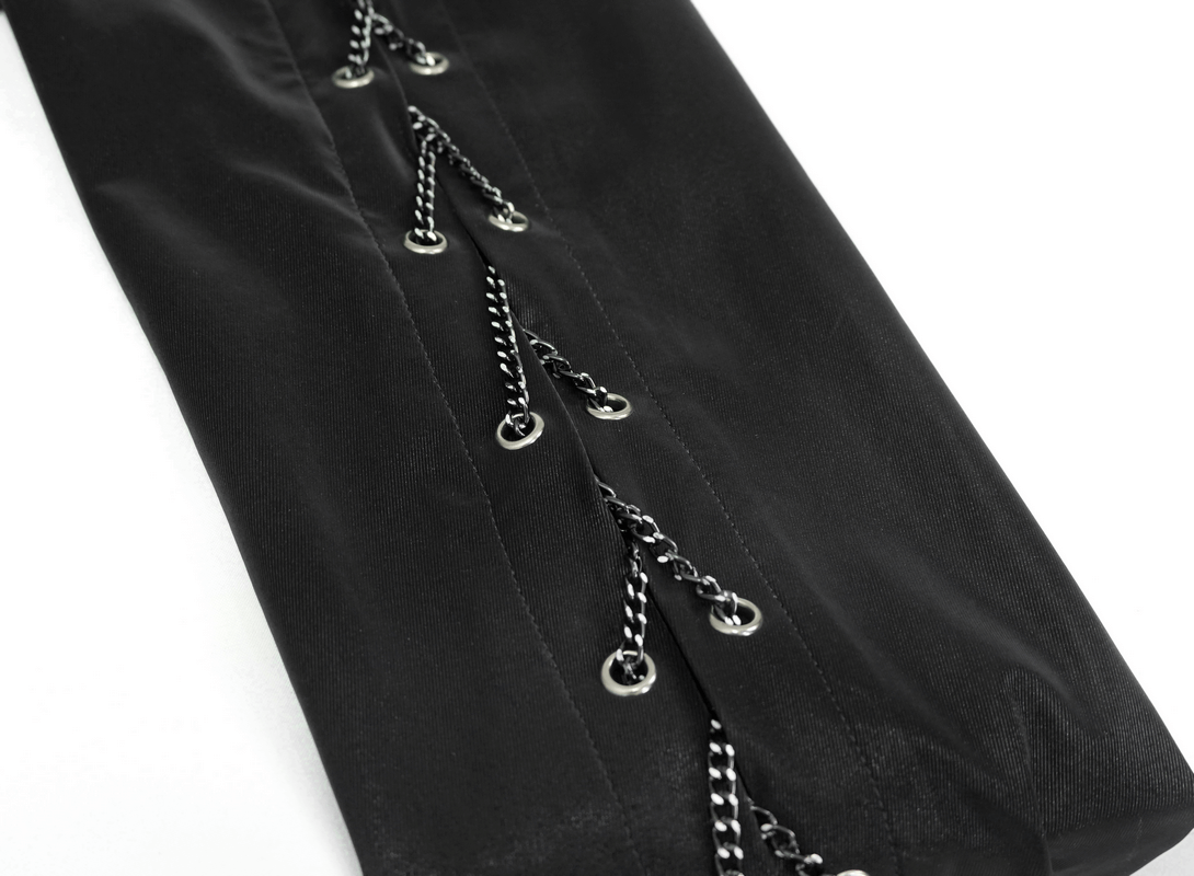 Close-up of black punk rock long sleeve shirt with decorative chains and eyelets for a stylish look.