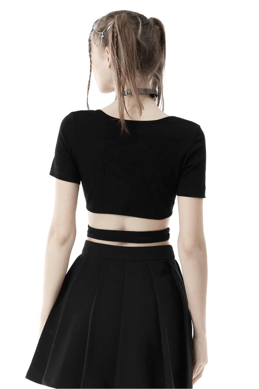 Back view of a black punk rock crop top paired with a black skirt, showcasing edgy style and rebellious fashion.