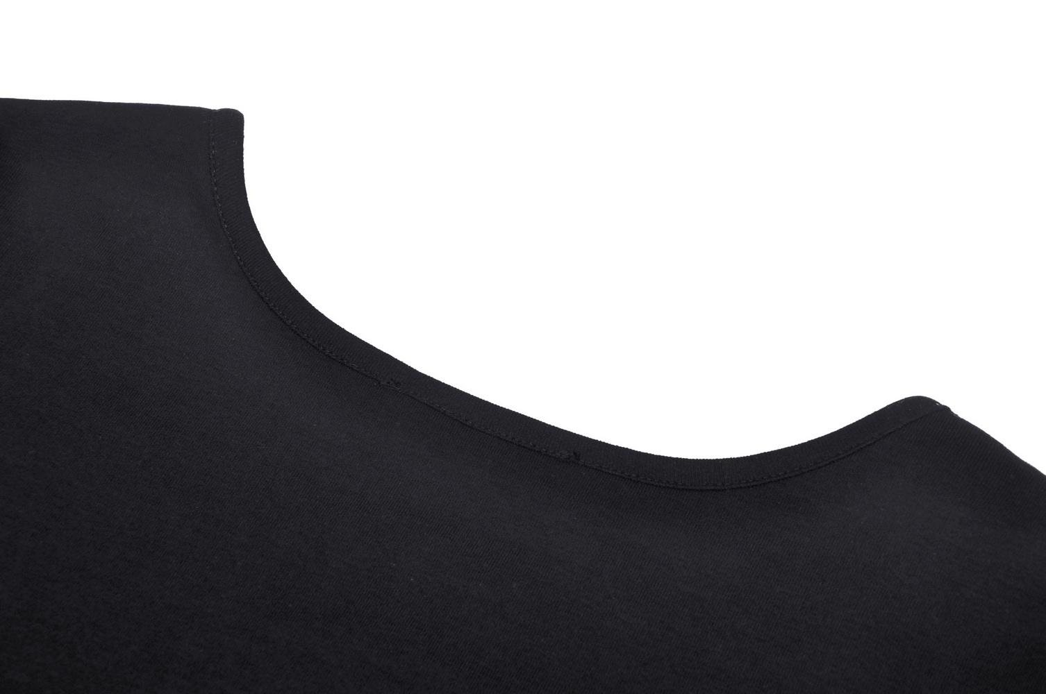 Close-up of the neckline of a punk rock black crop top, highlighting its soft black fabric and stylish design.