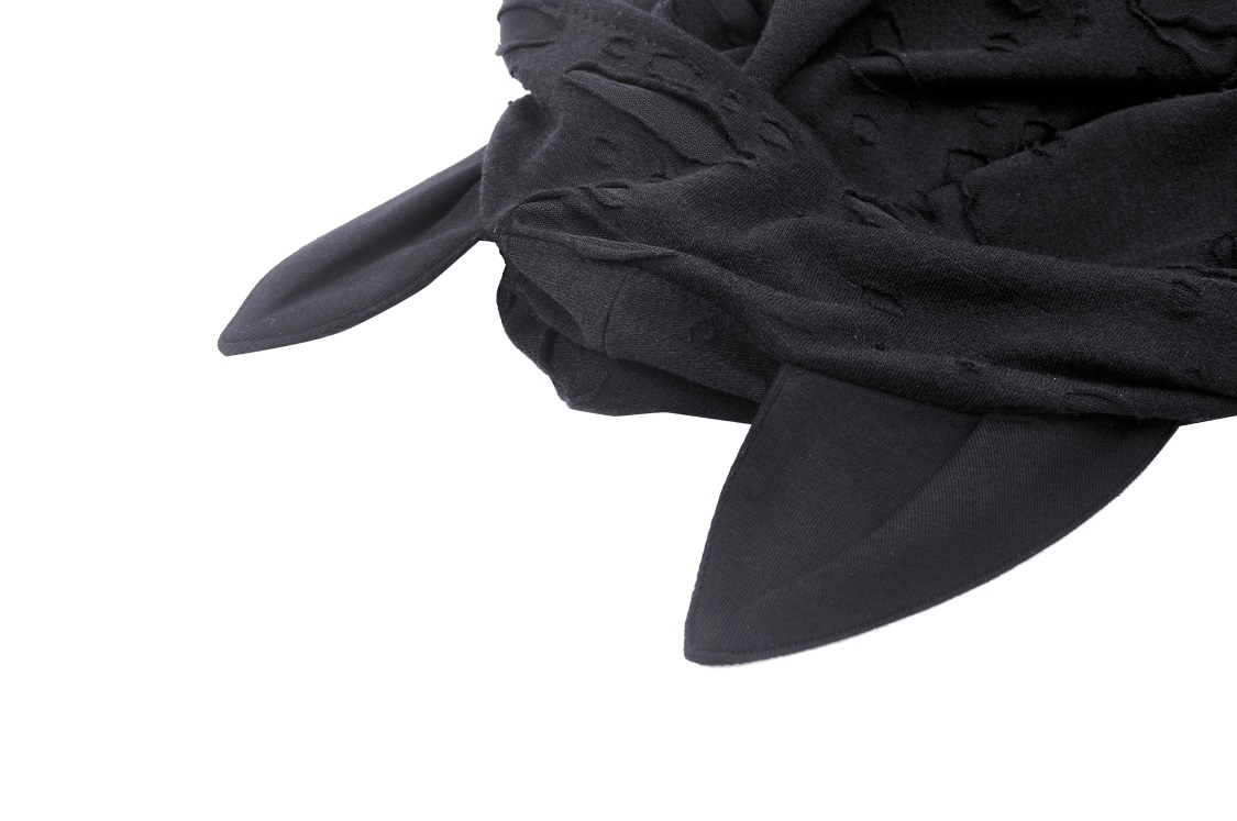 Black lace-up crop top with playful cat ears and textured design, perfect for a punk rock look.