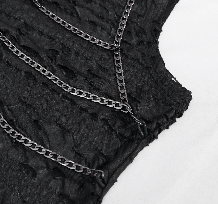 Close-up of punk rock black sleeveless tank top featuring broken holes and stylish chain detailing.