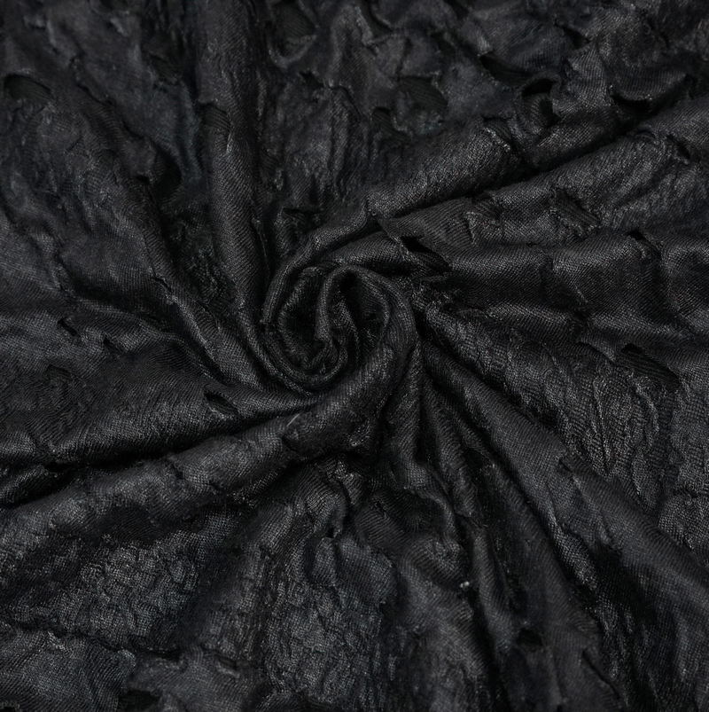 Close-up view of black fabric with broken holes, showcasing punk rock style texture for men's sleeveless tank tops.