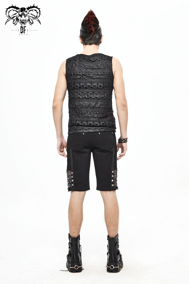 Men's black sleeveless punk rock tank top showcasing a trendy design with broken holes, styled with edgy shorts and boots.