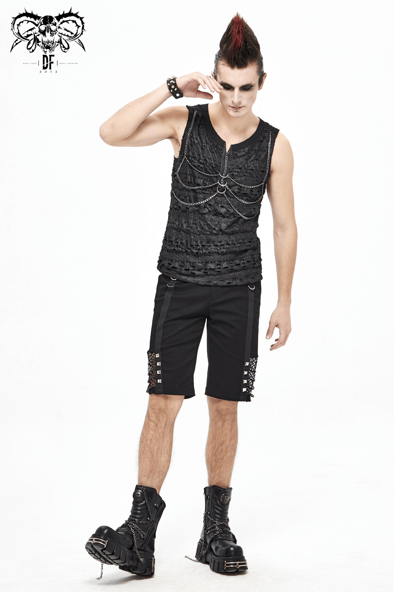 Trendy men's punk rock sleeveless tank top in black with chains, paired with stylish shorts and combat boots.