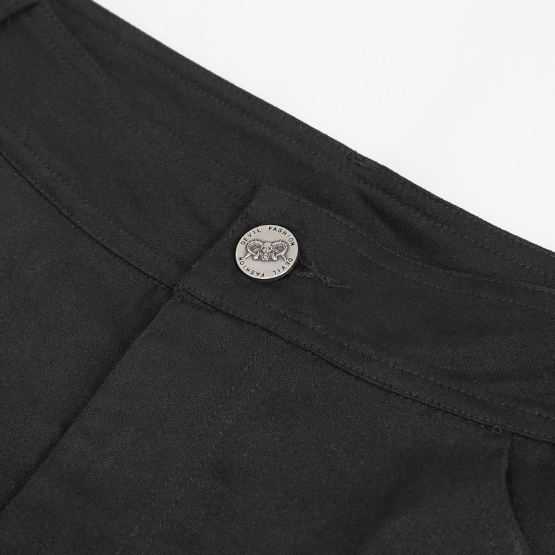 Close-up of the button and waistband of men's black punk rock fitted pants with leather harness.