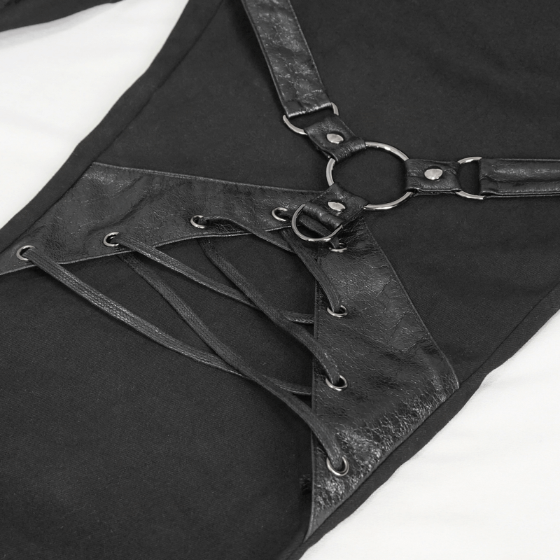Close-up of black punk rock fitted pants featuring a stylish leather harness and laced design for an edgy look.