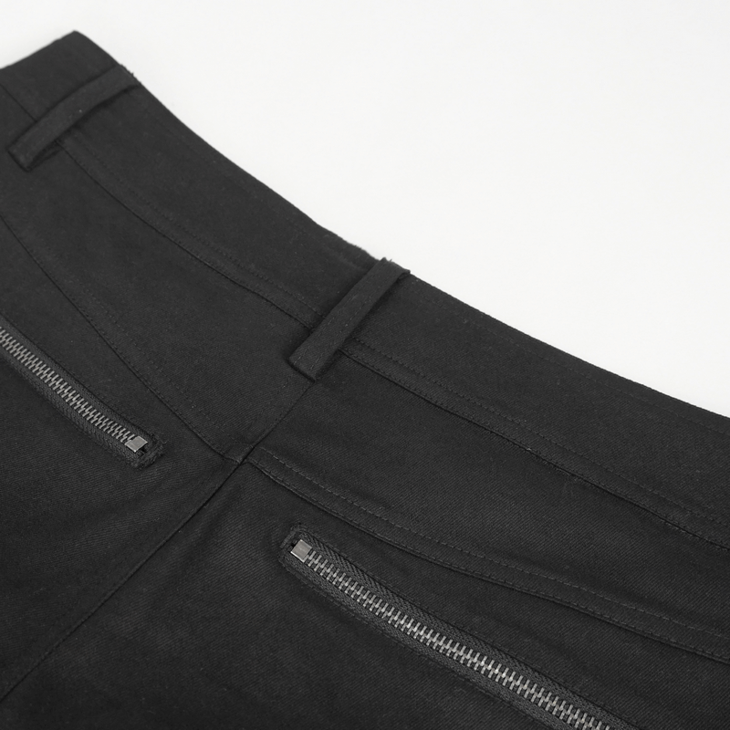 Close-up of men's black punk rock fitted pants featuring stylish zipper pockets and sleek fabric.
